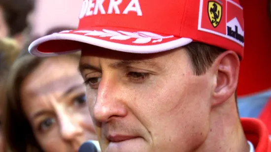 German driver Michael Schumacher of Ferrari bites his lip after finishing the free practice session of the Japanese Formula One Grand Prix at Suzuka 29 October 1999. Schumacher finished the third with a time of 1 minute 42.215 seconds. (ELECTRONIC IMAGE),Image: 20485129, License: Rights-managed, Restrictions:, Model Release: no