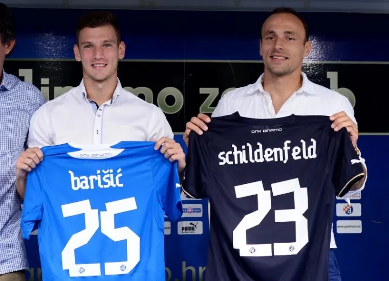 Gordon Schildenfeld (30) i Borna Barišić (22) službeno su predstavljeni u prostorijama Dinama kao pojačanja hrvatskog prvaka u ljetnom prijelaznom roku.