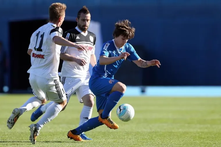 Dinamo i Rijeka, prva i druga momčad prvenstva, slavile su u 26. kolu 1. HNL istim rezultatom, 2:1. Dinamo je pobijedio Slaven Belupo, a Rijeka Osijek.