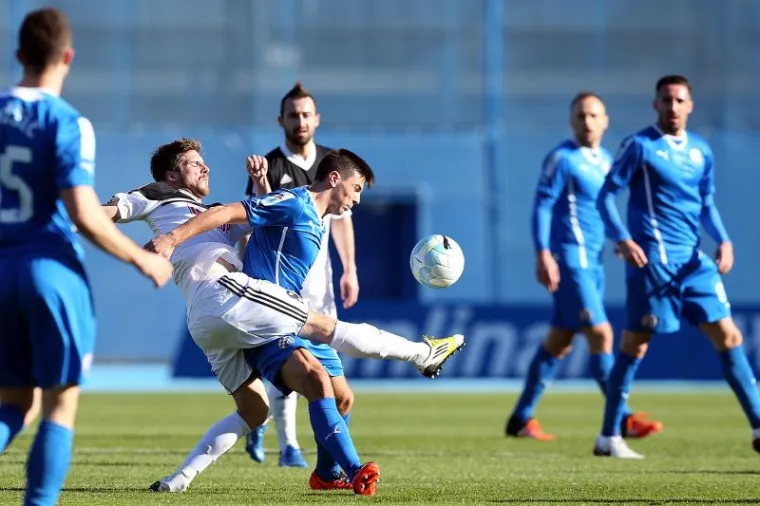 Dinamo i Rijeka, prva i druga momčad prvenstva, slavile su u 26. kolu 1. HNL istim rezultatom, 2:1. Dinamo je pobijedio Slaven Belupo, a Rijeka Osijek.