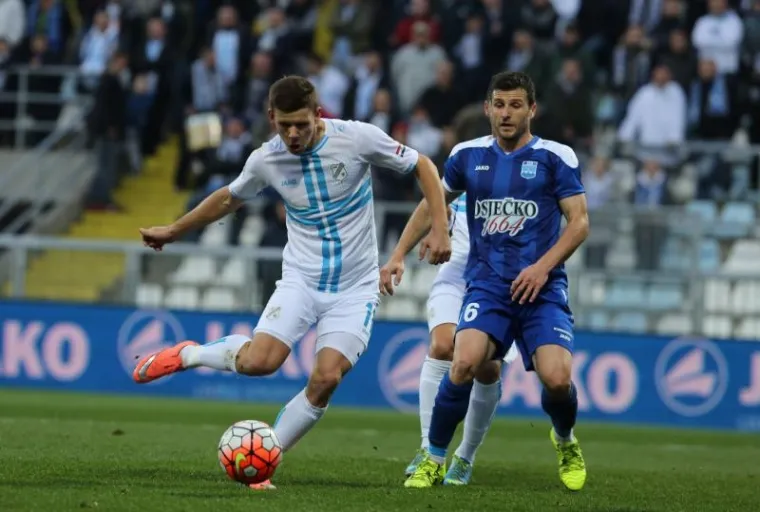 Dinamo i Rijeka, prva i druga momčad prvenstva, slavile su u 26. kolu 1. HNL istim rezultatom, 2:1. Dinamo je pobijedio Slaven Belupo, a Rijeka Osijek.