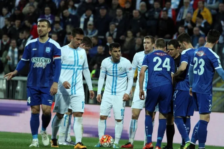 Dinamo i Rijeka, prva i druga momčad prvenstva, slavile su u 26. kolu 1. HNL istim rezultatom, 2:1. Dinamo je pobijedio Slaven Belupo, a Rijeka Osijek.