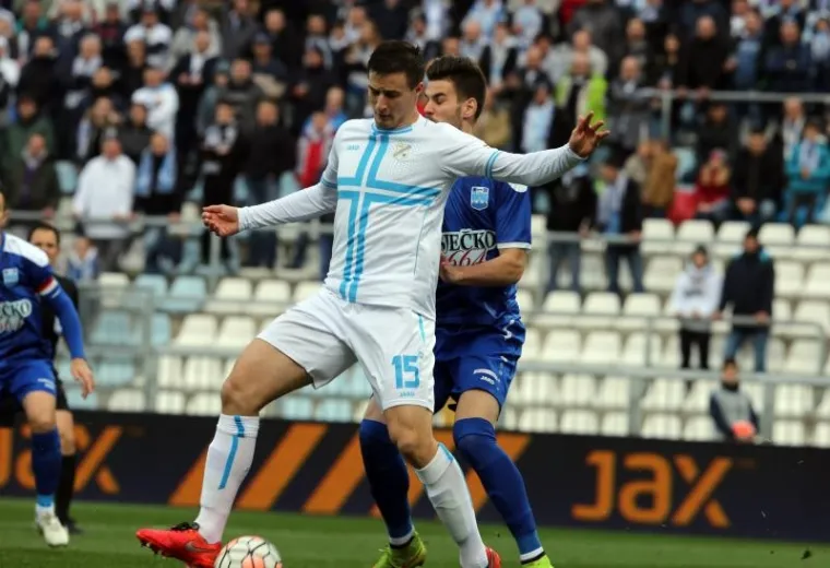 Dinamo i Rijeka, prva i druga momčad prvenstva, slavile su u 26. kolu 1. HNL istim rezultatom, 2:1. Dinamo je pobijedio Slaven Belupo, a Rijeka Osijek.