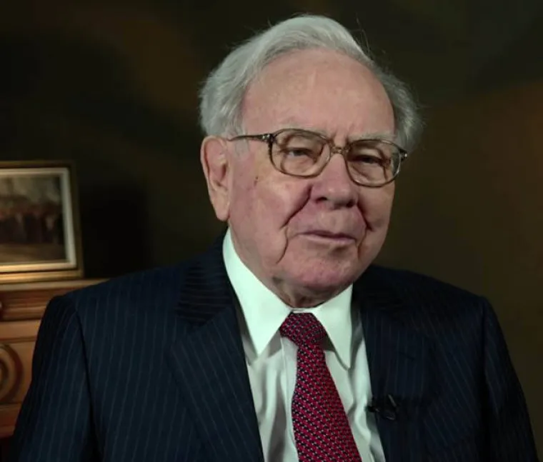 Milijarder Warren Buffet svira ukulele.