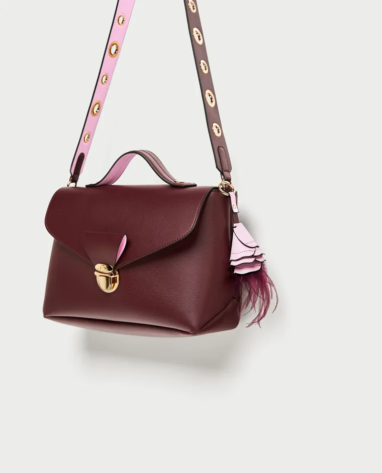 City torbica s privjeskom u obliku cvijeta, Zara, 299,90 kuna