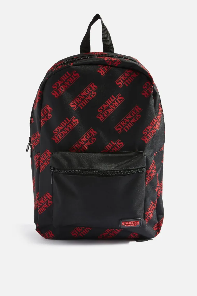 Crni ruksak s crvenim natpisima Stranger Things, Topshop, 244,10 kuna