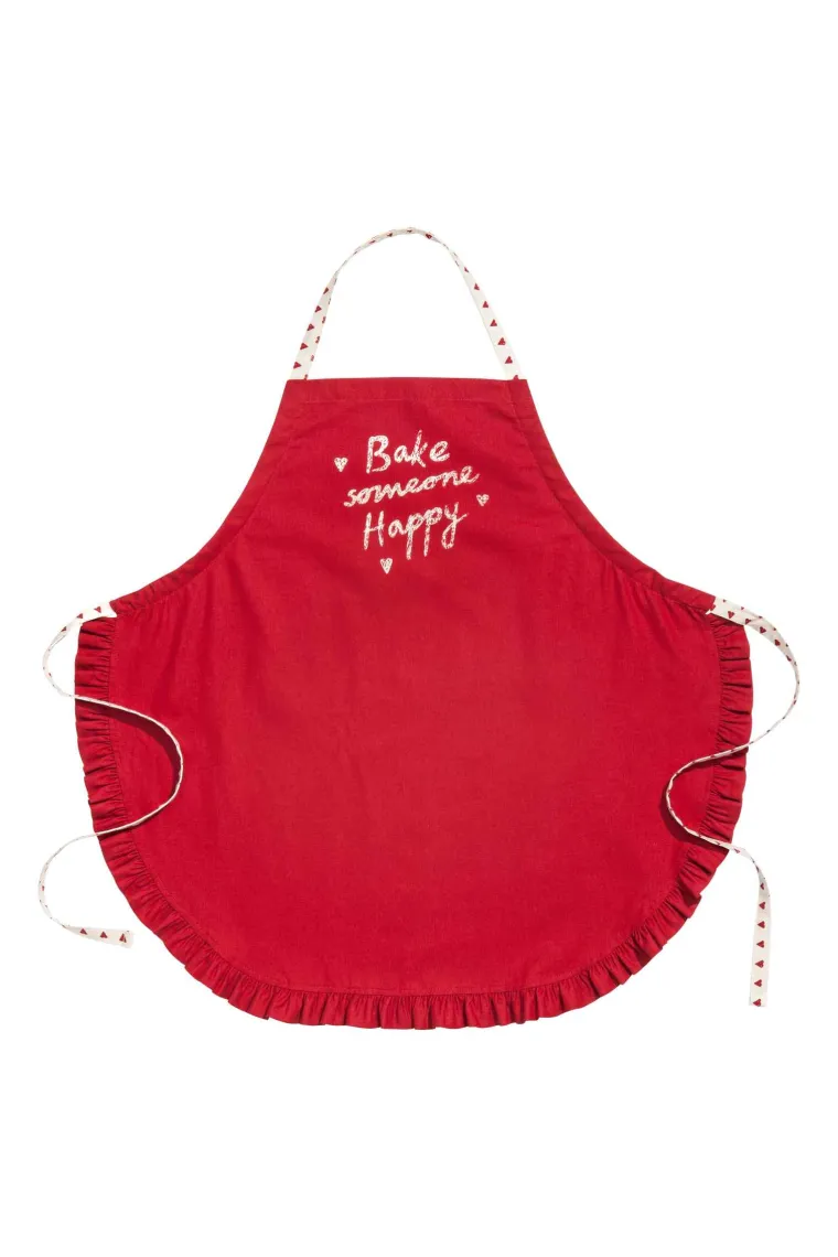 Crvena pregača s natpisom, H&amp;M Home, 84,36 kuna