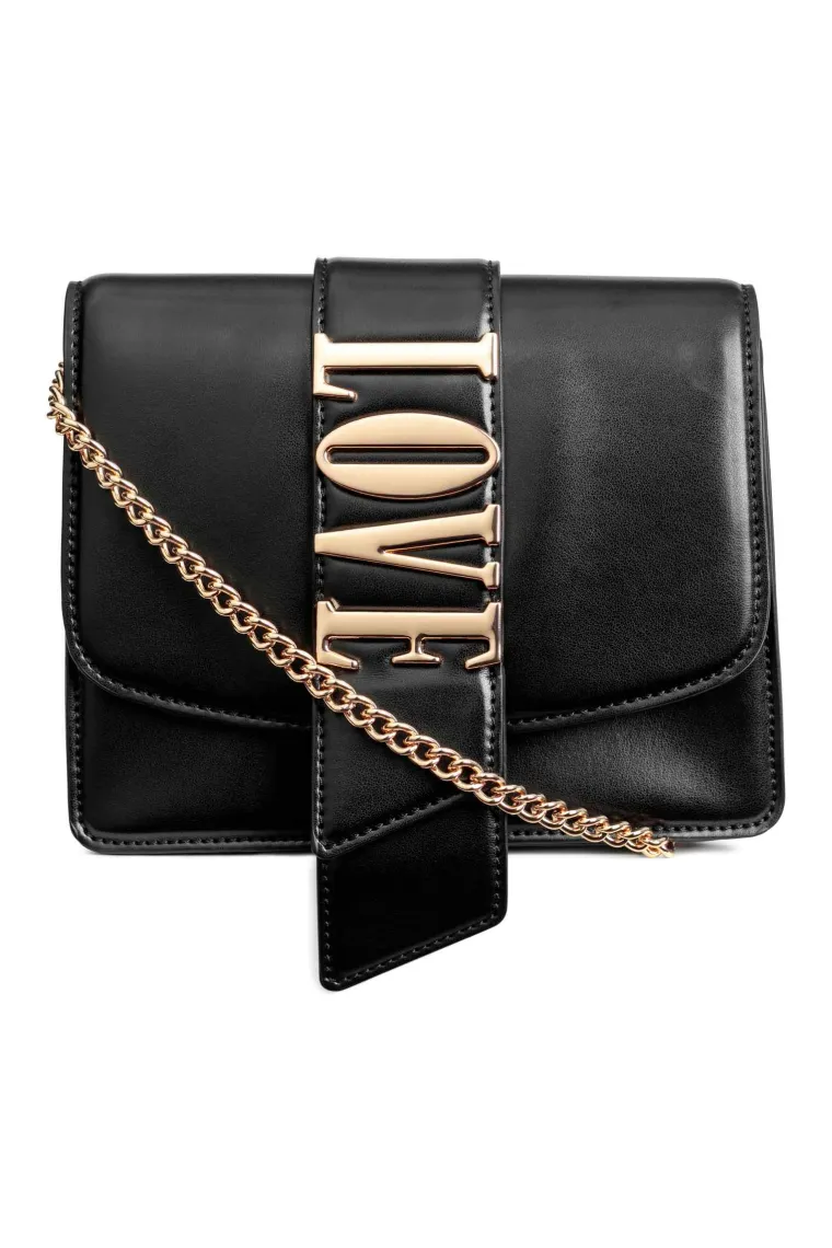 Torba s lancem i metalnim slovima, 187,42 kune