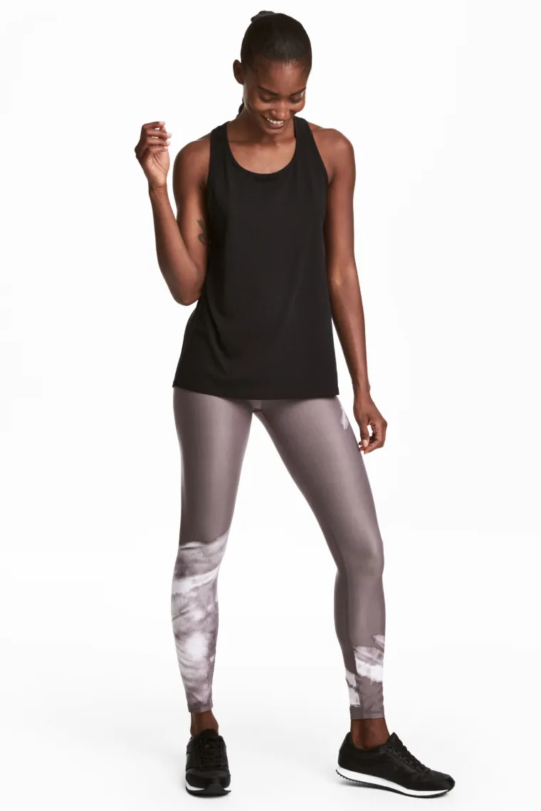 Sportske pink tajice s bijelim šarama, H&amp;M, 221,99 kuna