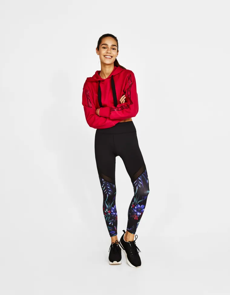 Sportske tajice cvjetnog printa s 'naked' trakom, Bershka, 169,90 kuna