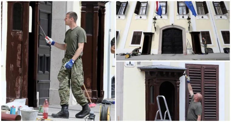 Je li to stvarno njihov posao? Vojnici farbaju kućice ispred zgrade Vlade...