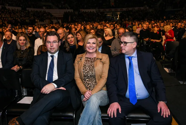 06.12.2019., Zagreb - U KC Dražen Petrović održan je koncert Tomislava Bralića i klape Intrade. ministar regionalnog razvoja i fondova EU Marko Pavić, predsjednica RH Kolinda Grabar-Kitarović, Zvonimir Sunara.  Foto: Josip Regović/PIXSELL