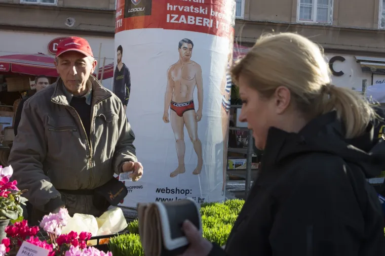 Predsjednica u ležernom izdanju: Sa suprugom Jakovom posjetila Dolac, kupila bakalar i družila se s kumicama