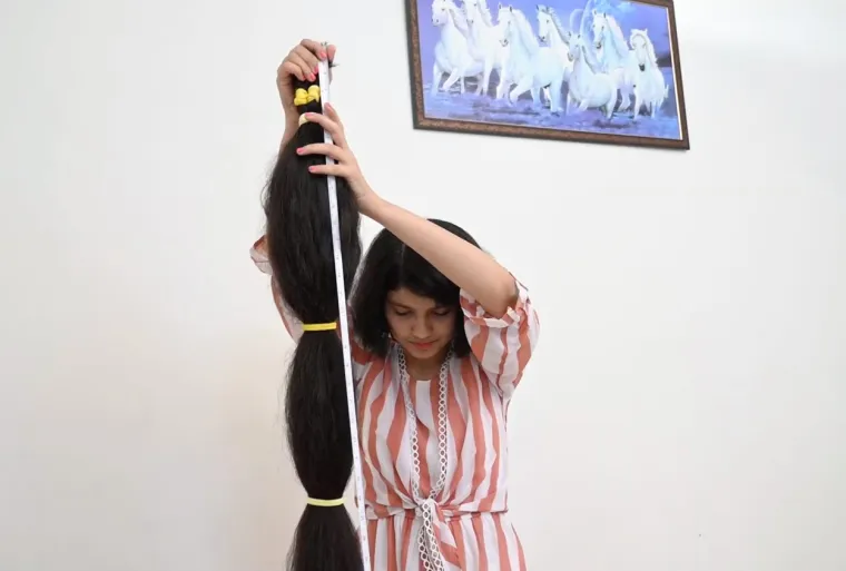 Kad joj je bilo 16 godina, kosa joj je mjerila 170,5 cm. Prošlog srpnja, neposredno prije svog 18. rođendana, kosa joj je posljednji put izmjerena i dosegla je nevjerojatnih 200 cm.