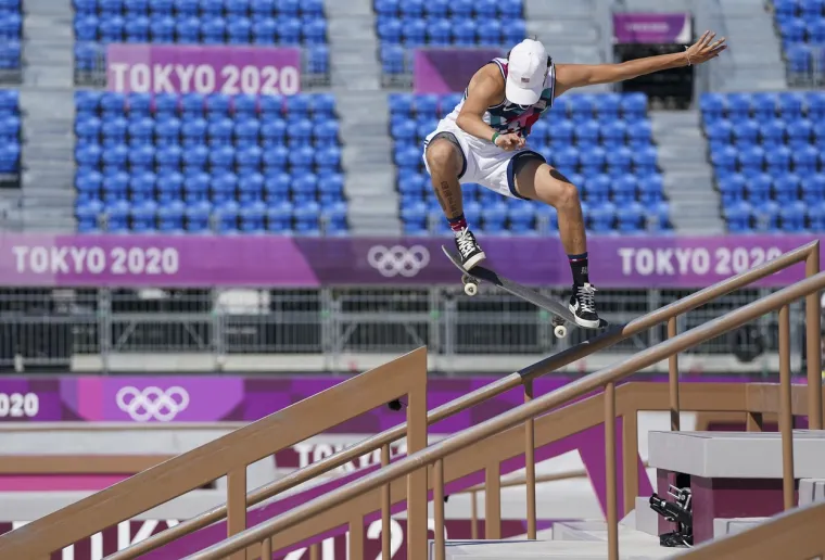 Amerikanac osvojio medalju sa slušalicama u ušima i mobitelom u džepu