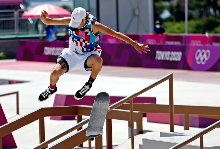 Amerikanac osvojio medalju sa slušalicama u ušima i mobitelom u džepu