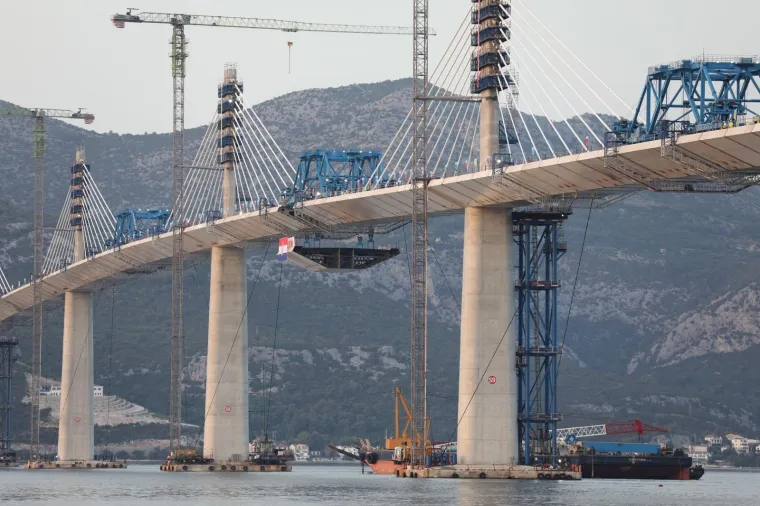 Svečanost spajanja posljednjeg segmenta konstrukcije Pelje&scaron;kog mosta. Photo: Ivo Cagalj/PIXSELL