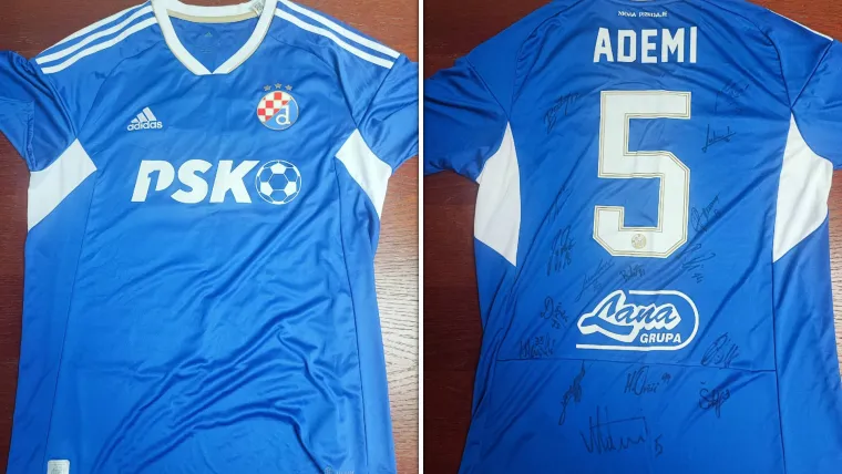 Dres kapetana Dinama s potpisima suigrača