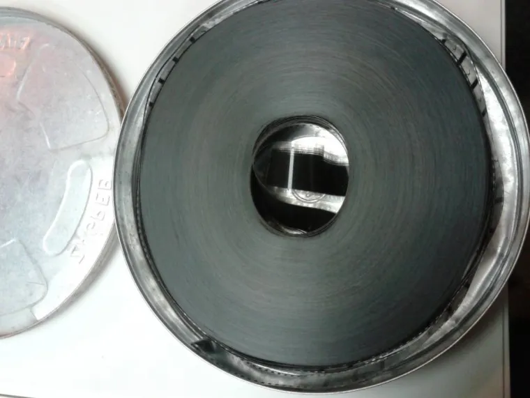 66,36 € / 500 kn - Film Tito u Togu. Očuvan u limenoj kutiji.