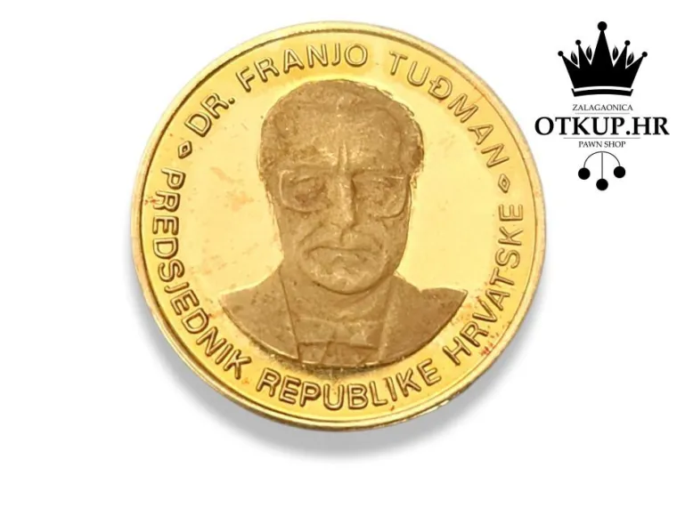 484,44 &euro; / 3650 kn. Zlatnik s likom Franje Tuđmana. Masa: 7,05 graman, čistoća zlata: (21,6K) .900 