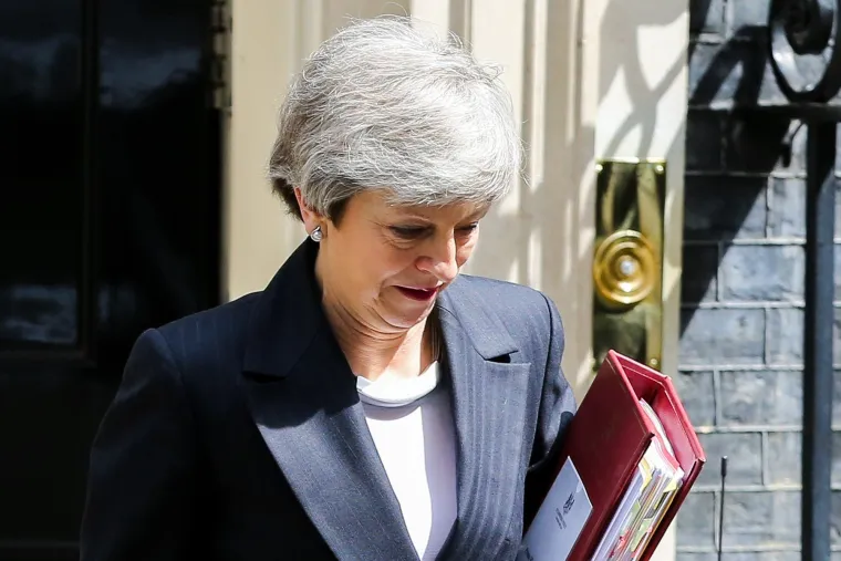 British Prime Minister Theresa May is seen departing from Number 10 Downing Street to attend Prime Minister's Questions (PMQs) in the House of Commons on the eve of European Parliament elections., Image: 435769597, License: Rights-managed, Restrictions: *** World Rights ***, Model Release: no, Credit line: Profimedia, SIPA USA
