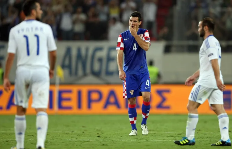 Od golobradog dječaka do neprijelaznog bedema: Ovako je izgledao put Dejana Lovrena u dresu Vatrenih