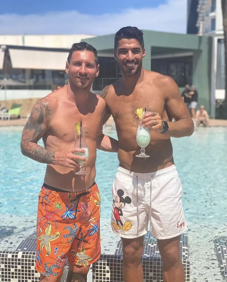 Lionel Messi, Luis Suarez
