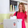 SDP je prepoznao njezin angažman, pa je ubrzo napredovala unutar stranke.