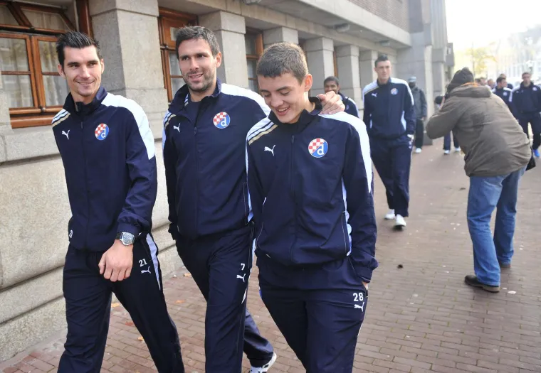 02.11.2011., Amsterdam - Igraci GNK Dinama nakon ručka uoči utakmice 4. kola UEFA Lige prvaka izmedju Ajaxa i Dinama u šetnji gradom. Nikola Pokrivač, Jerko Leko, mladi Mateo Kovačić.