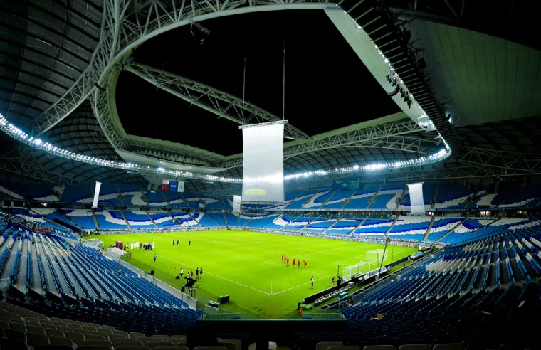 Arhitektica projekta je bila Zaha Hadid koja je preminula 2016. godine, a kada se radila na izgledu stadiona rekla je da je sama ideja stadiona bila imitirati jedra na tradicionalnom arapskom brodu dhow. Riječ je o nizu tradicionalnih jedrenjaka s jednim ili više jarbola, a koriste se u regiji Crvenog mora i Indijskog oceana.