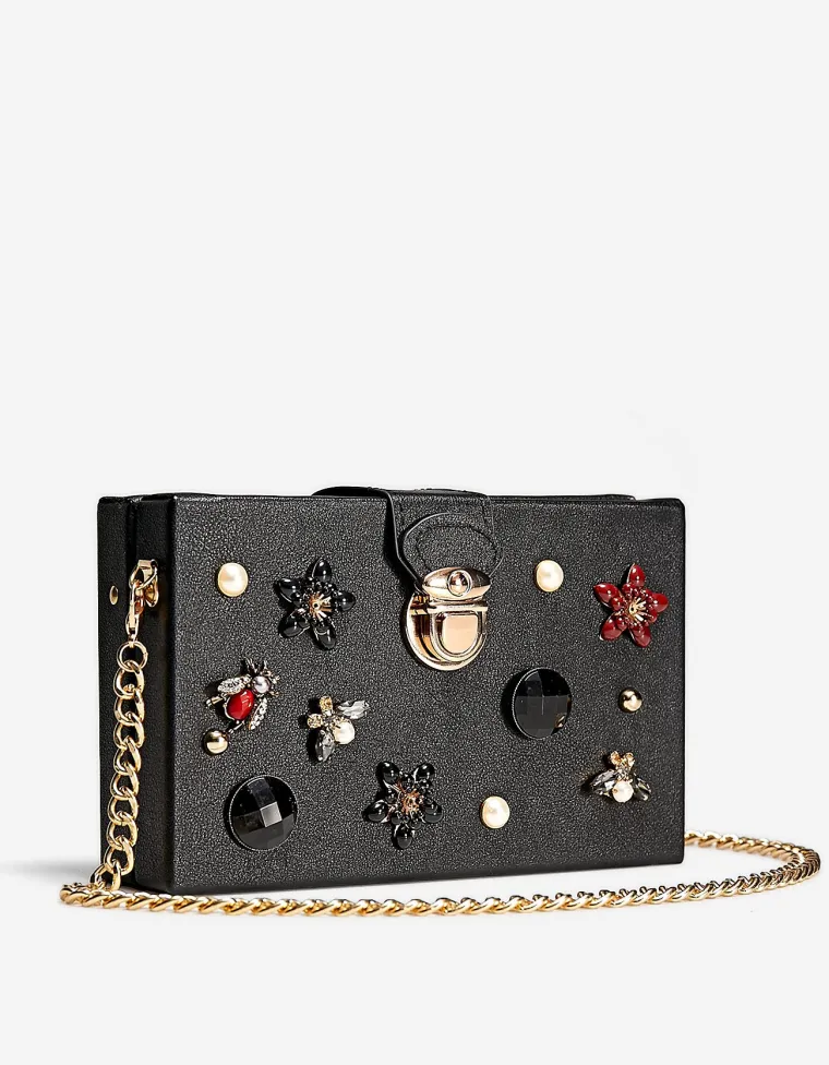 Clutch torbica s kristalićima, Stradivarius, 149,90 kuna