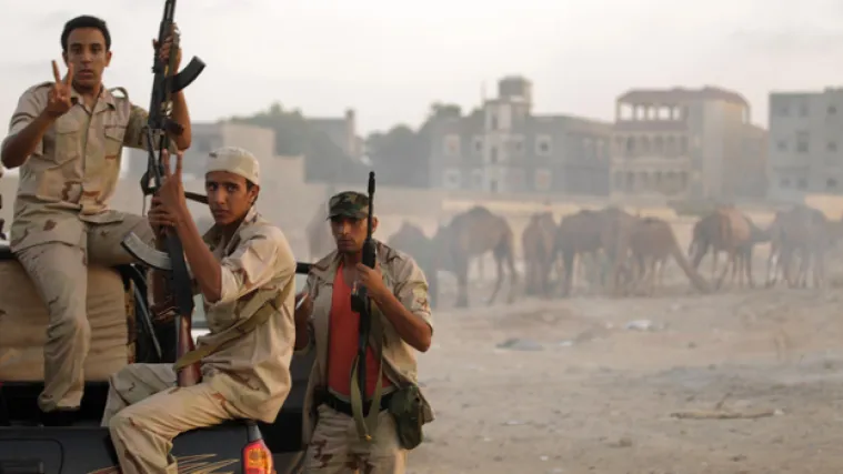 Pobunjenici opkolili Gadafija?