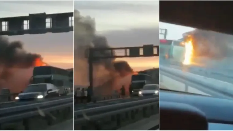 'Dim je gust, ljudi s prtljagom čekaju na zaustavnoj traci'