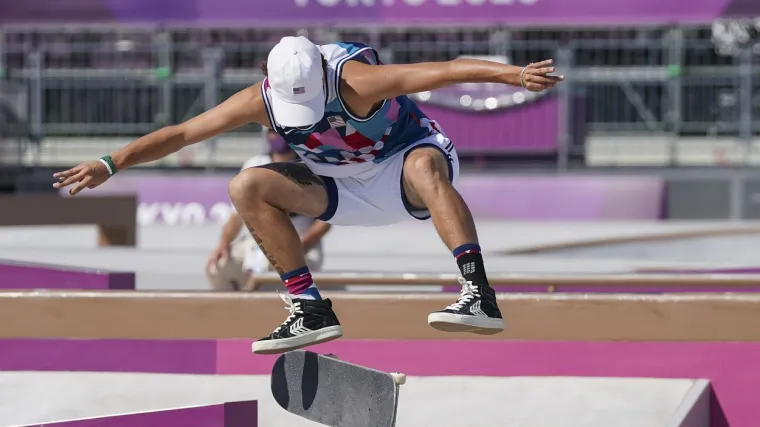 Amerikanac osvojio medalju sa slušalicama u ušima i mobitelom u džepu