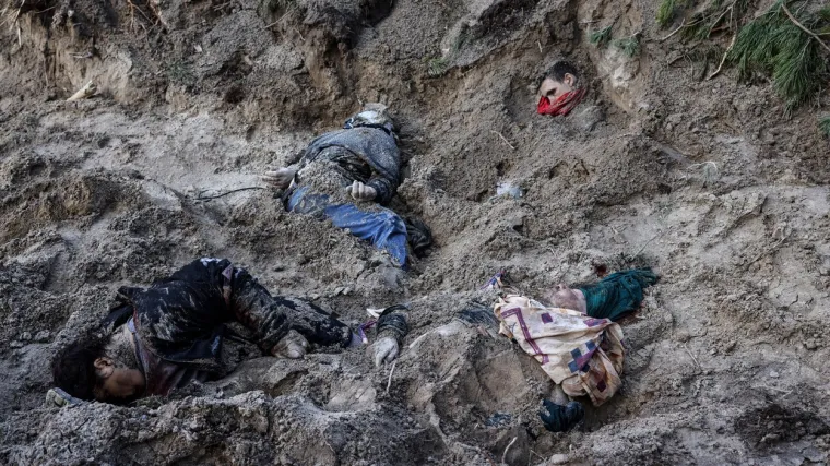 Ukrajinski nogometa&scaron; otet s ocem i majkom. Rusi ih mučili pa masakrirali. Objavljene potresne fotografije iz masovne grobnice