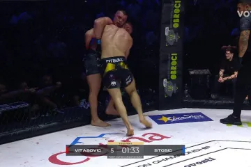 Kaos uz kavez tijekom glavnog meča večeri, poletjela boca, Cro Cop se digao sa svog mjesta