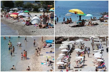 Kao da je srpanj! Od Splita do Zadra svi pohrlili po osvježenje: Pogledajte prizore s hrvatskih plaža